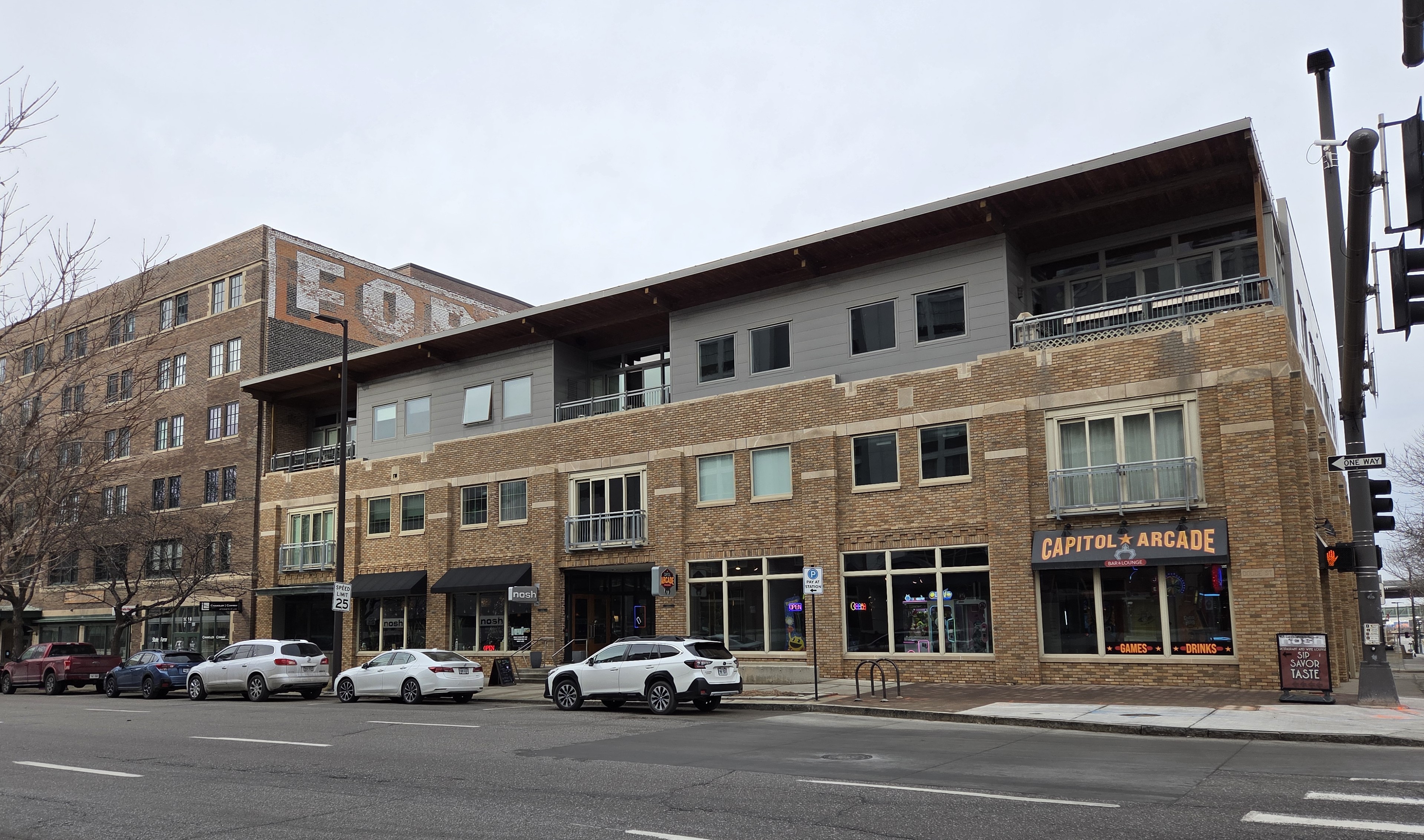 1000 Dodge Building from Fisk Tire to Nosh Wine Lounge and Capitol Arcade